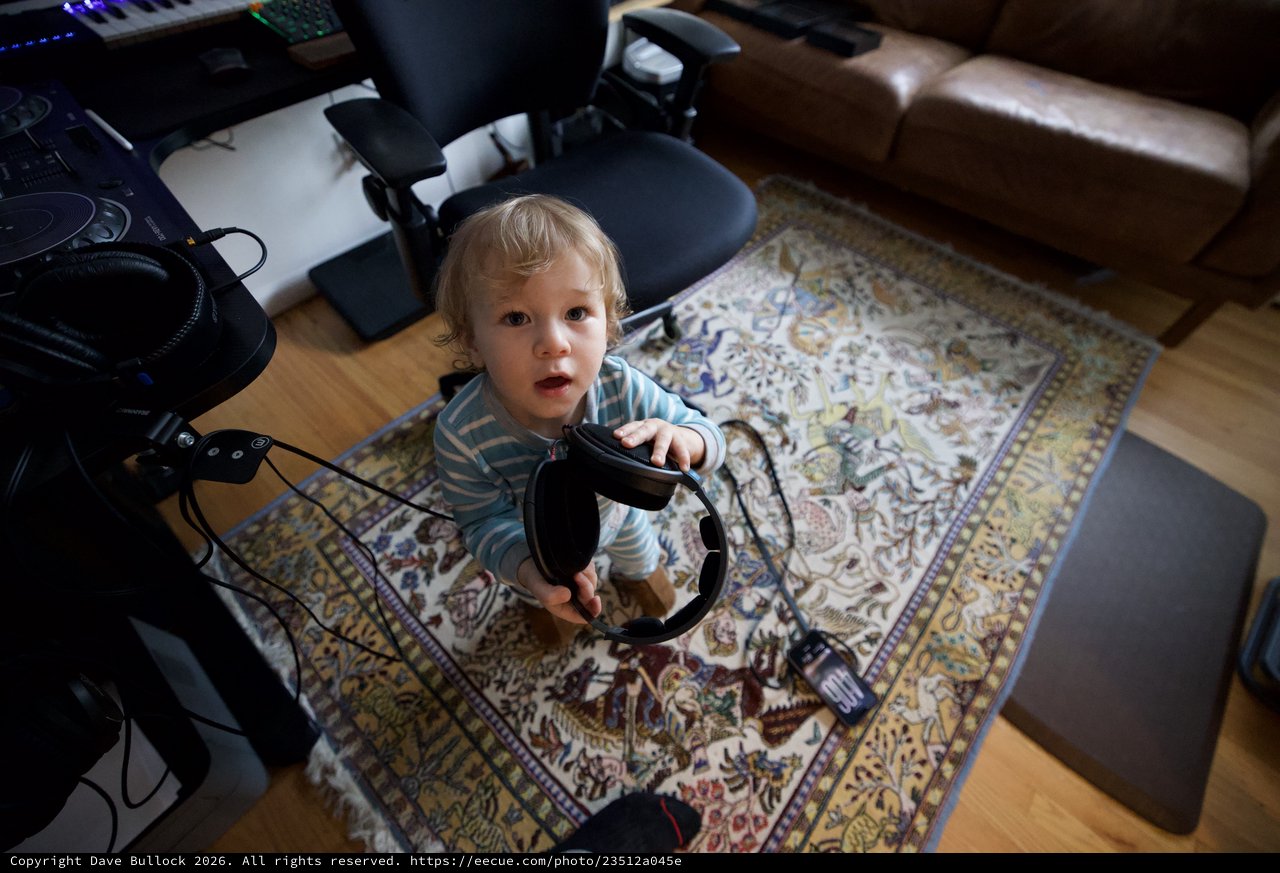 Toddler with Headphones in Home Music Studio