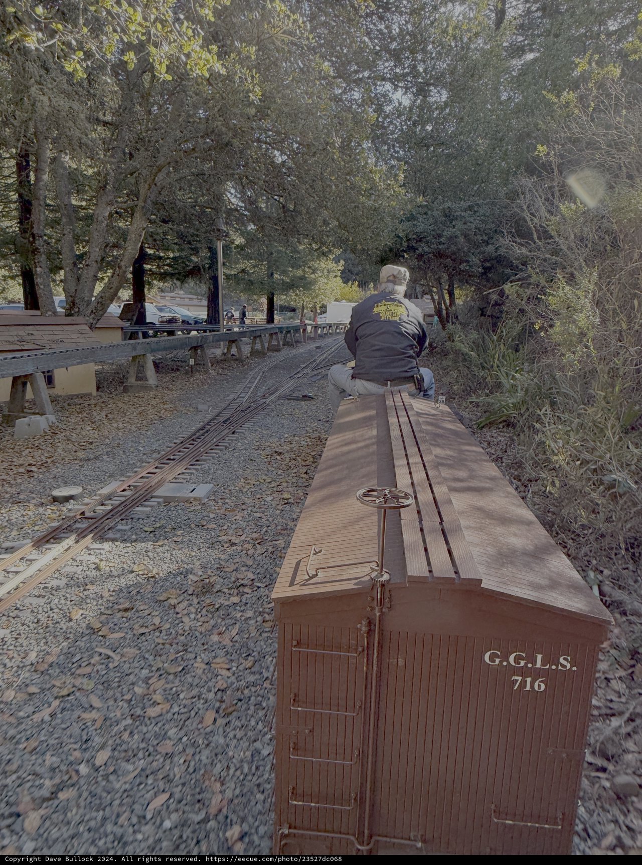 Model Railroad Enthusiast Working on Train Display