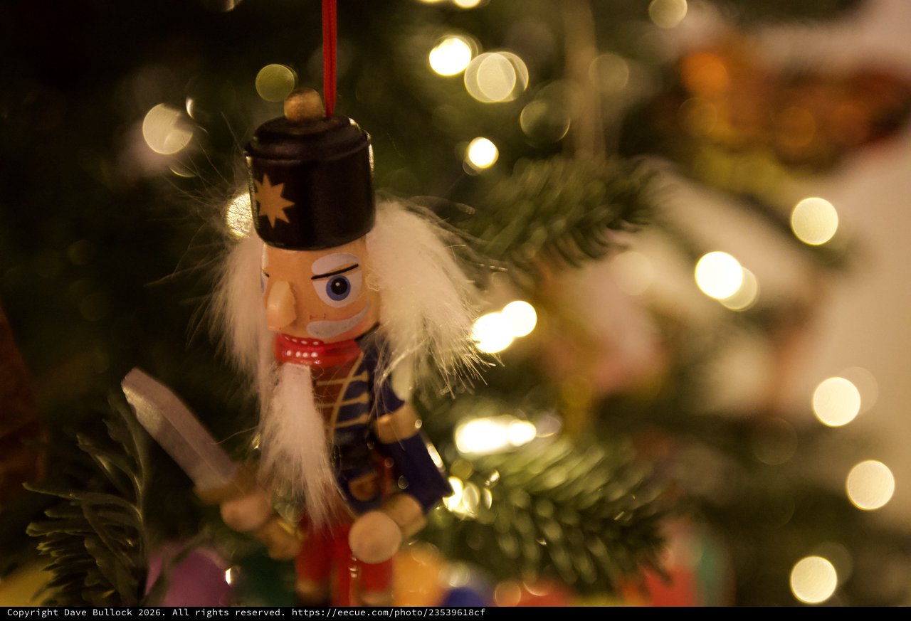 Nutcracker Ornament on Illuminated Christmas Tree