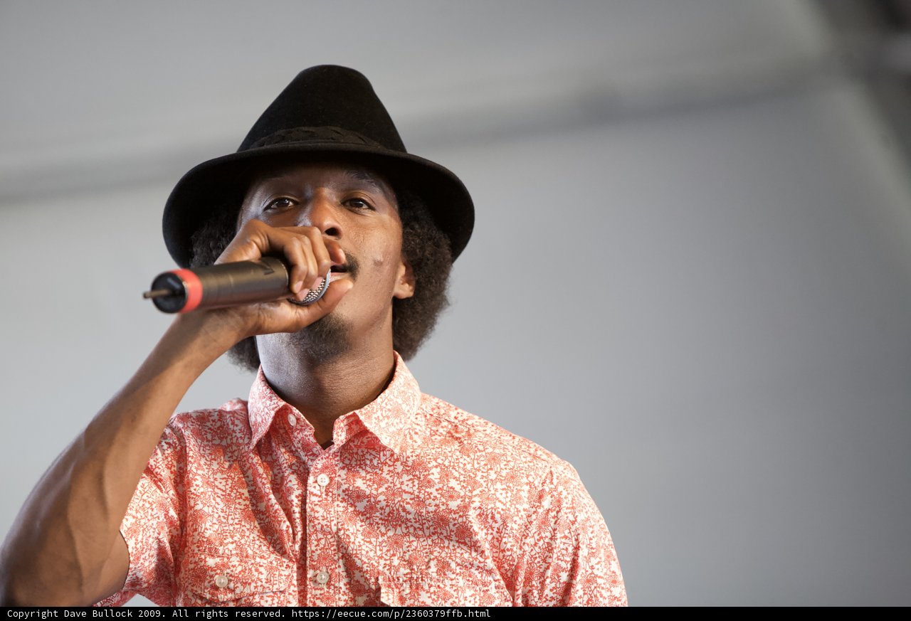 K'Naan Warsame Croons into the Crowd with Fedora and Mic