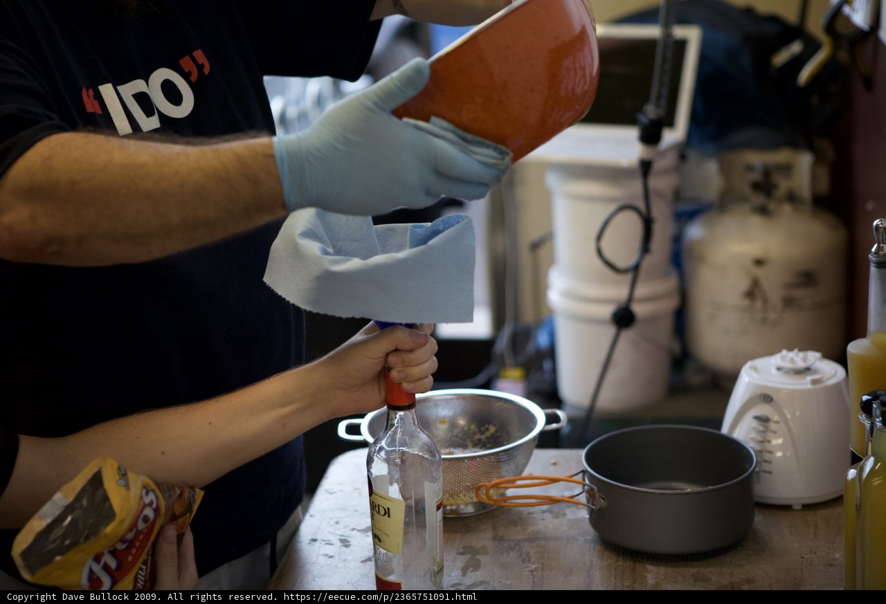 Gloved Hands Pouring Habanero Rum