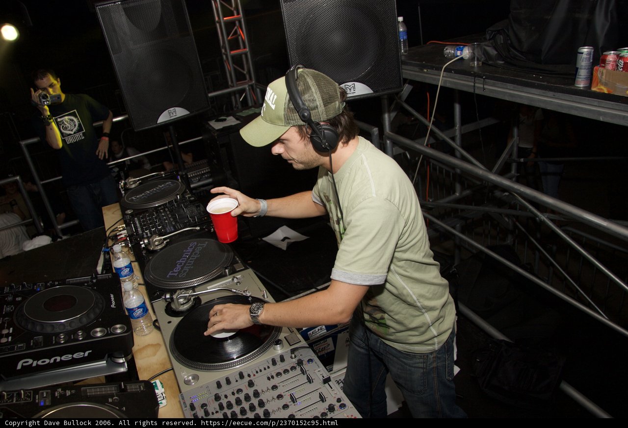 Rave DJ in Green Shirt
