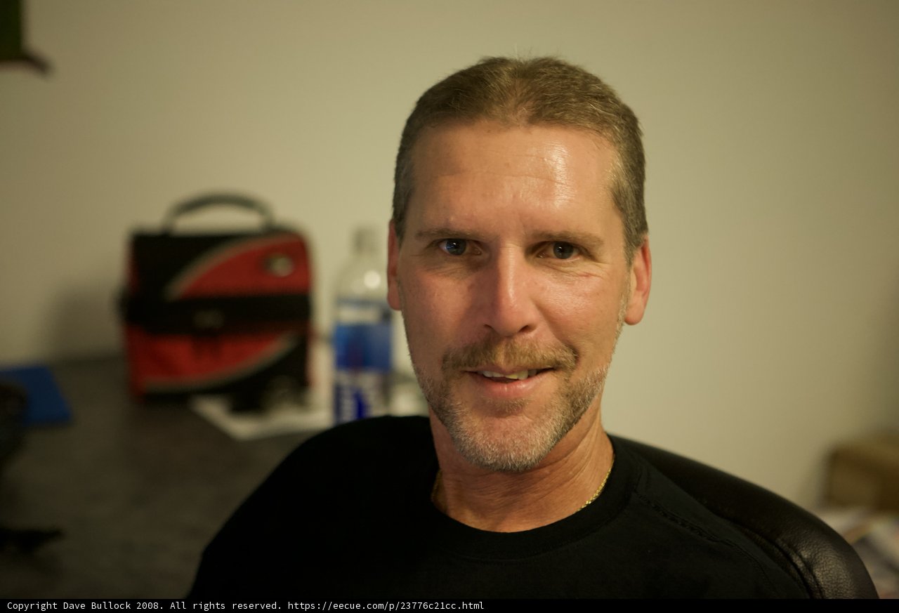 Mustached Man with a Black Shirt