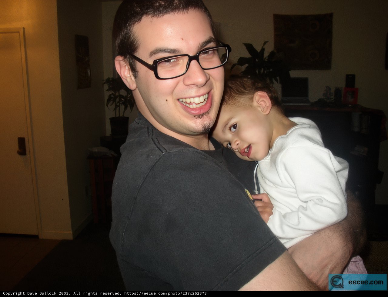 A Happy Father and His Bundle of Joy