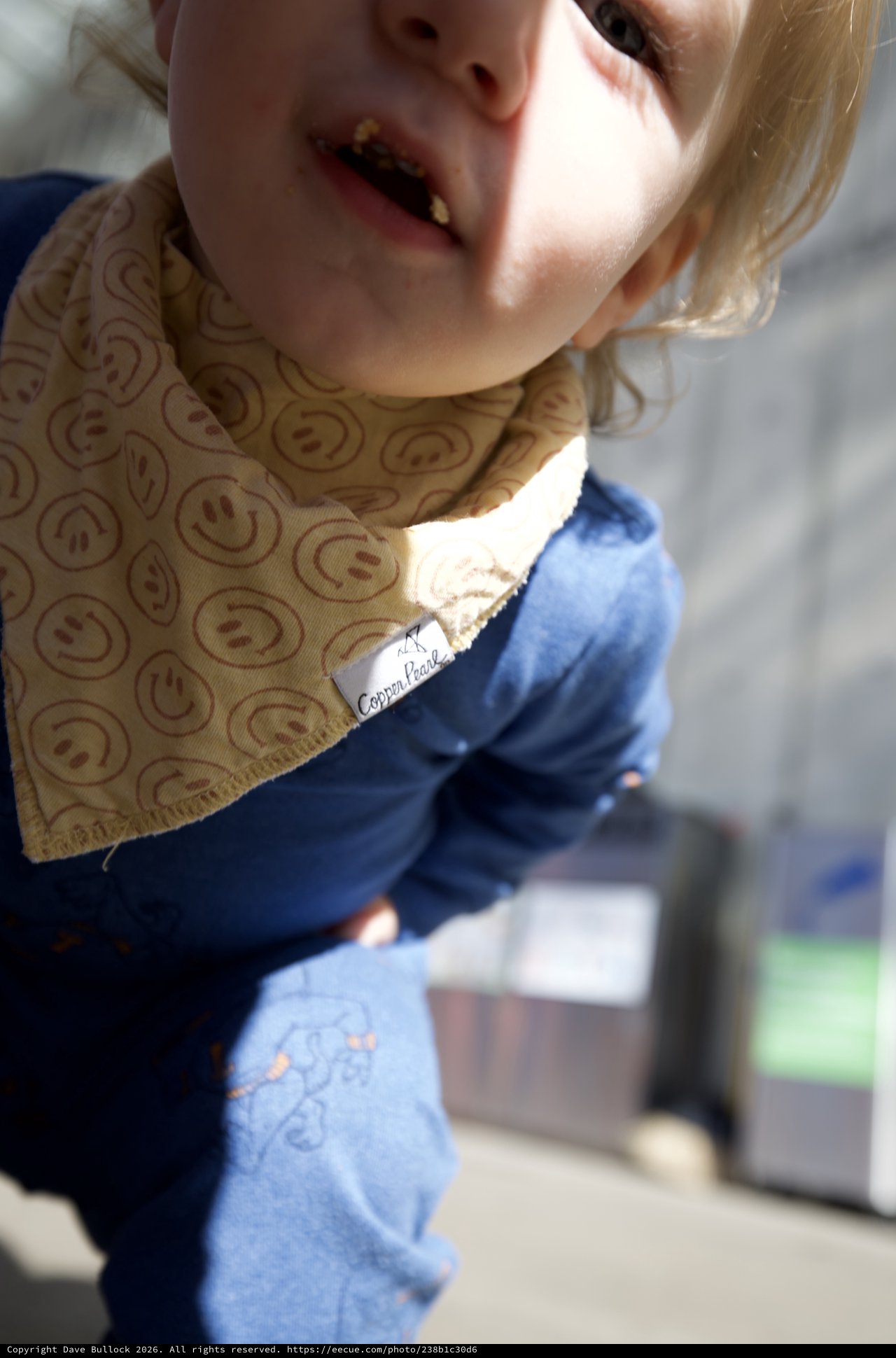 Young Child in Handmade Smiley Face Bandana