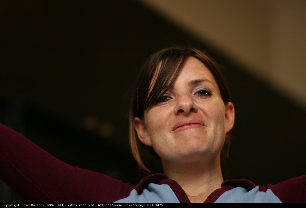 Football Fan Celebrates in Claret and Blue