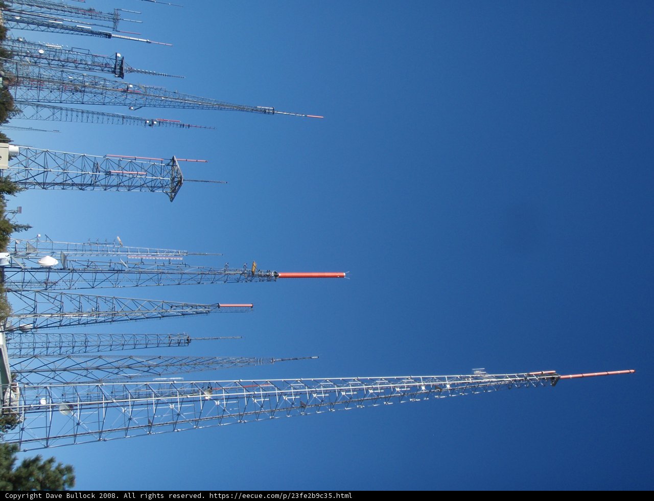 Towering Antennas against a Blue Sky
