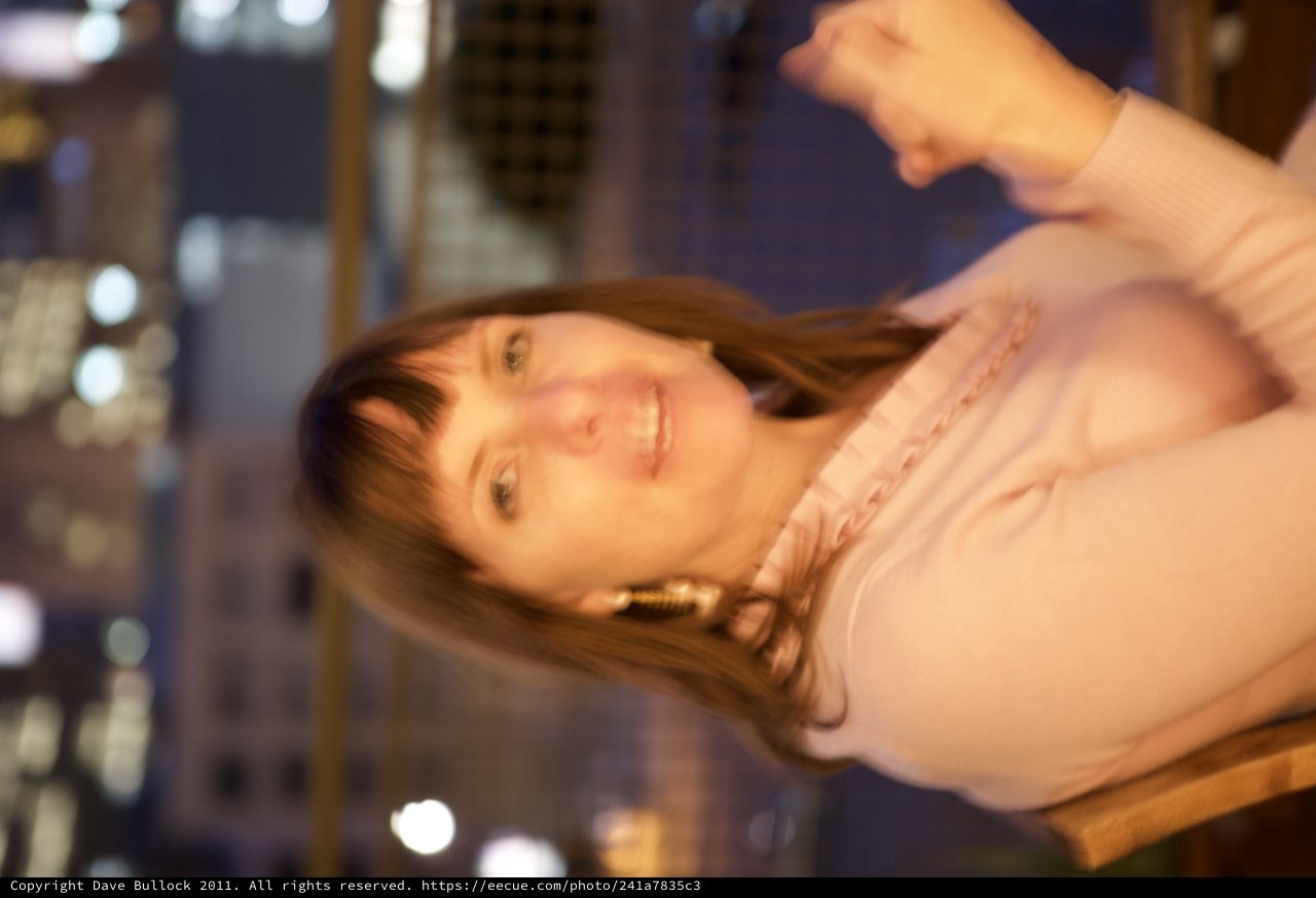 Penelope Smiling Softly at Sakura Crossing Night