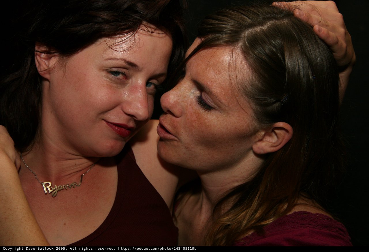 Two Women Share an Intimate Moment at Night