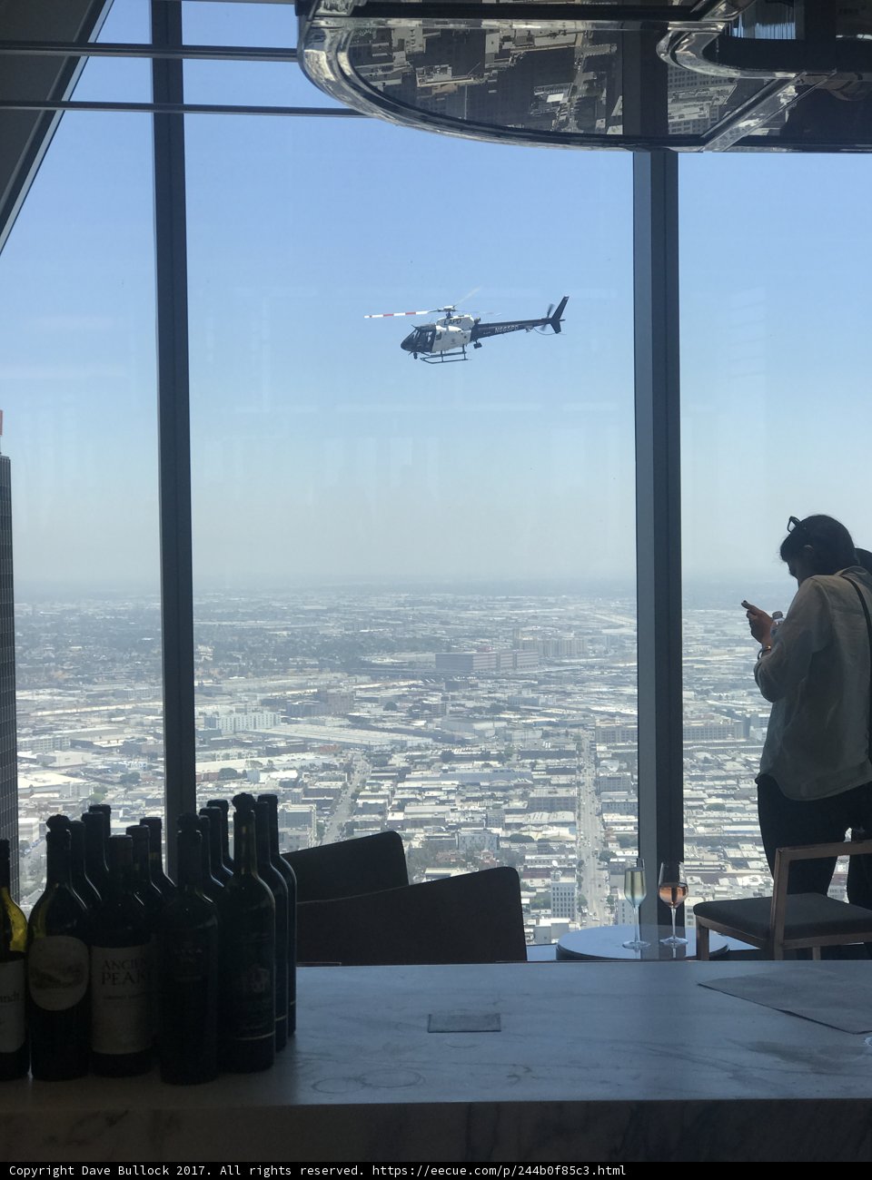 Helicopter Flying over a City