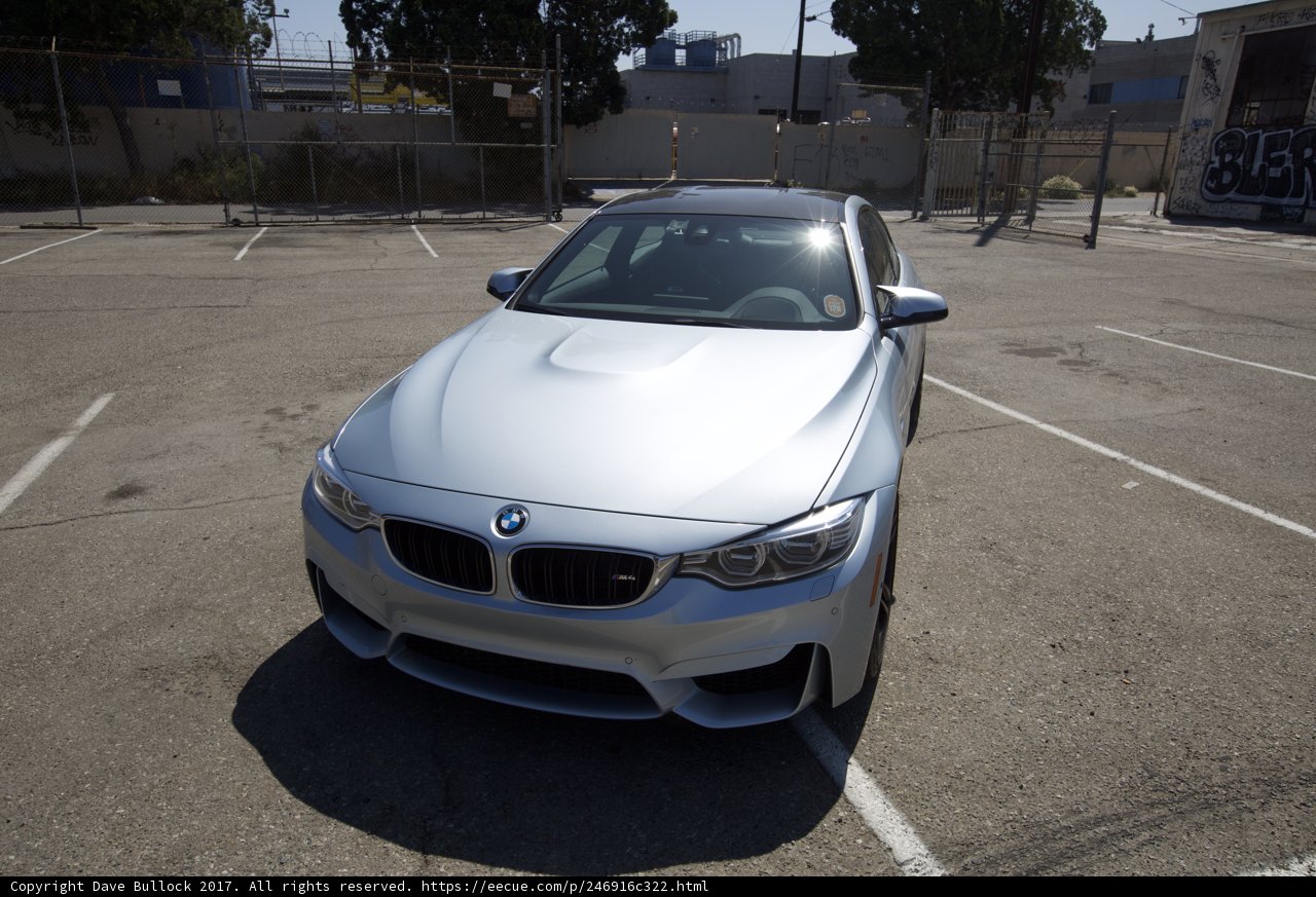 BMW M4 parked in a lot