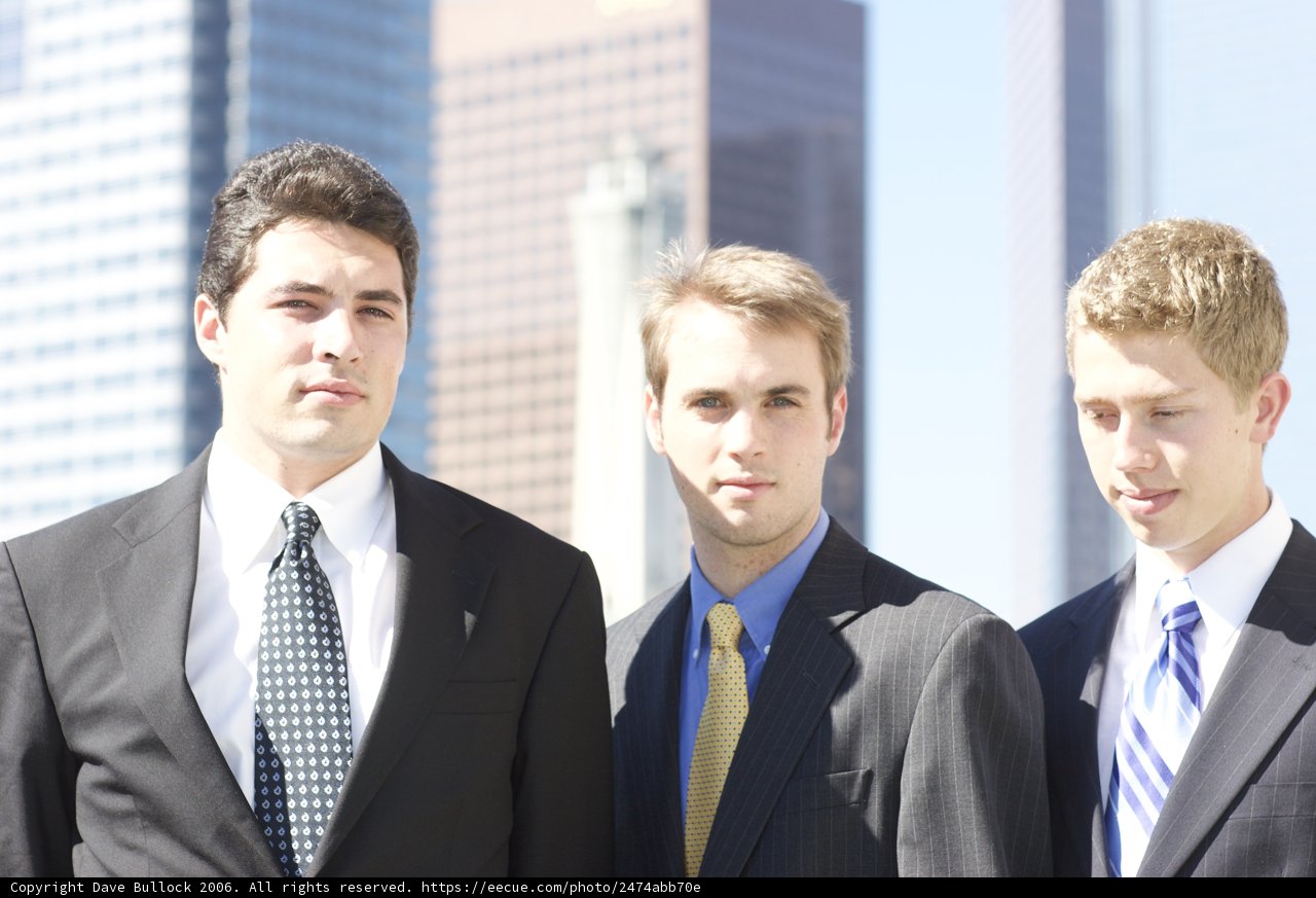 Three Men Rocking the Formal Look in the City