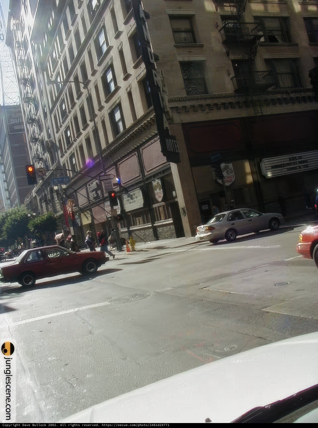 City Streets Busy with Cars and Pedestrians