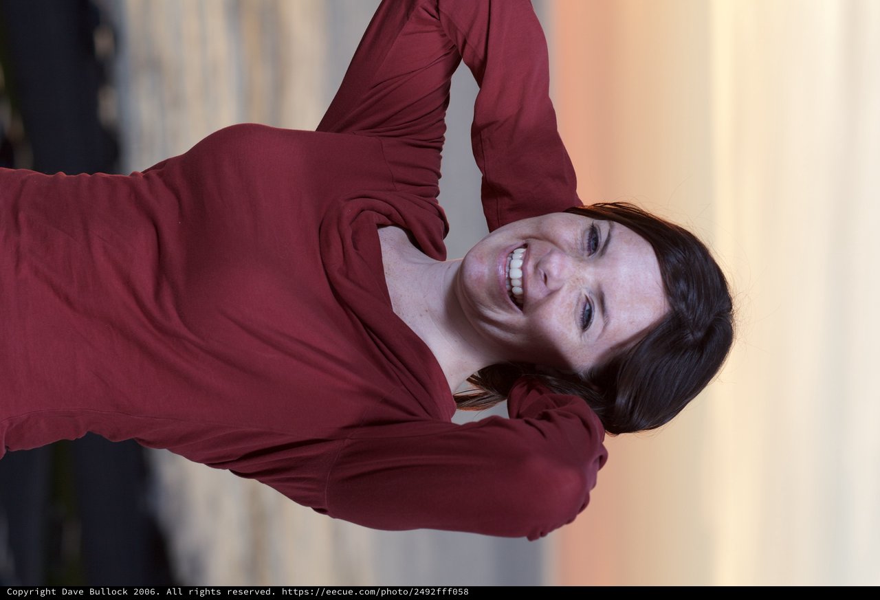 Joyful Woman at Sunset by the Sea