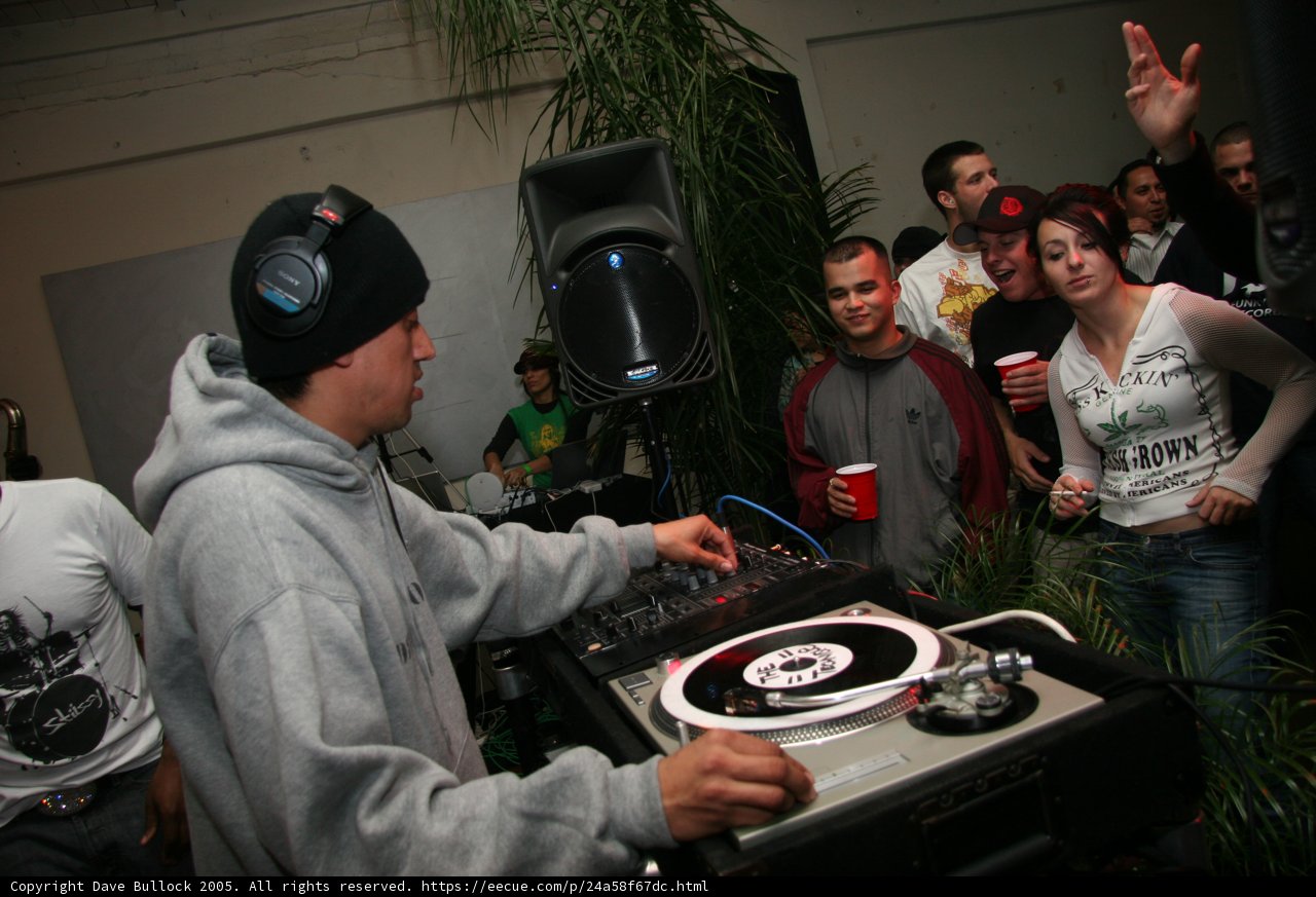 DJ Raul R Entertaining the Crowd in his Grey Hoodie
