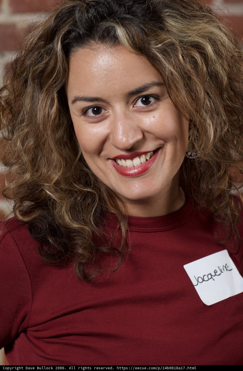 Curly-haired Woman with Captivating Smile