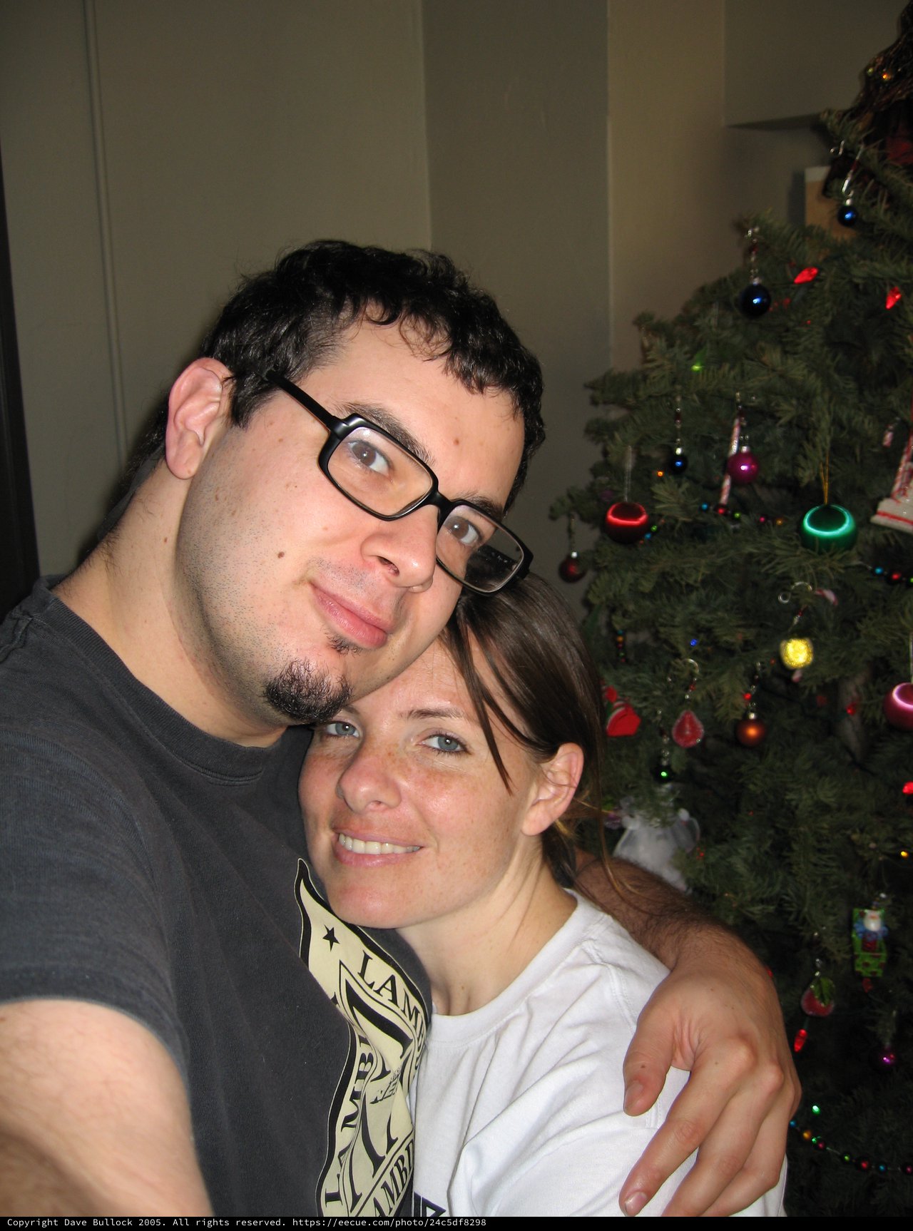 Couple Celebrating Christmas Eve Together at Home