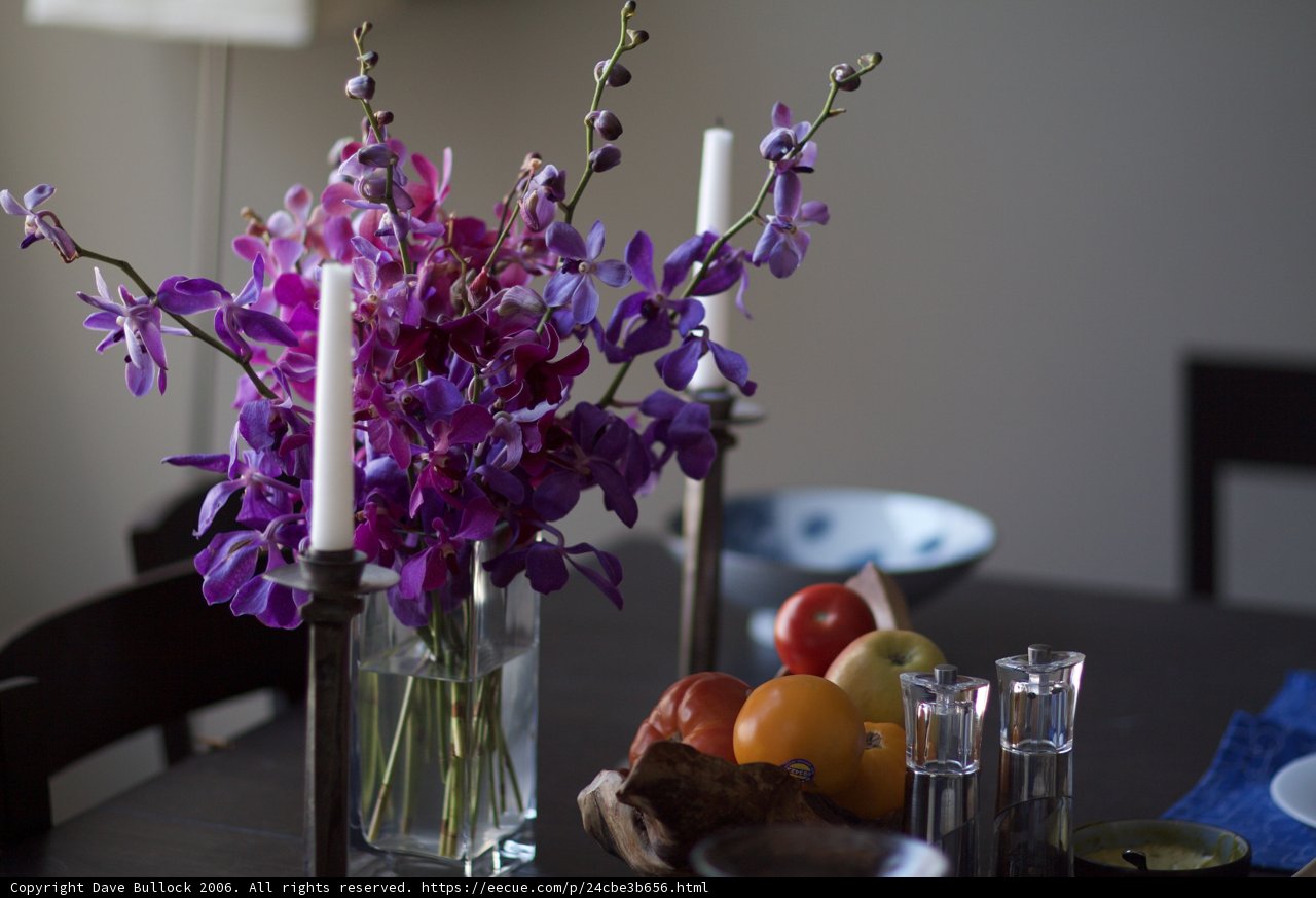Elegant Purple Flower Arrangement with Candles