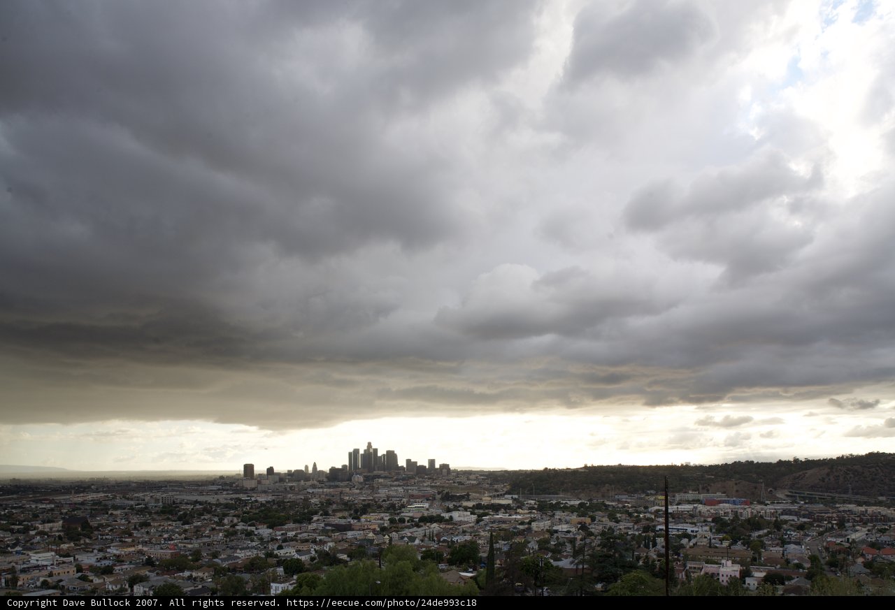 Cityscape Beneath a Cloudy Sky