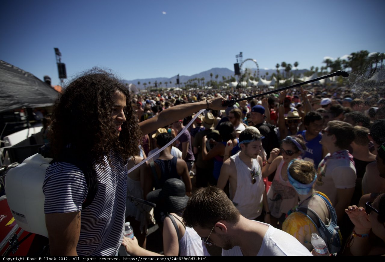 Stick-Wielding Festival Attendee