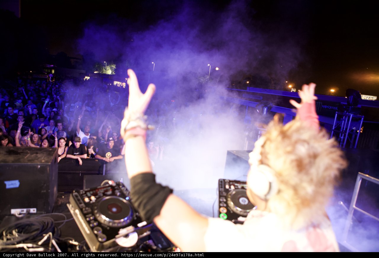 DJ Lights Up Night Club Crowd