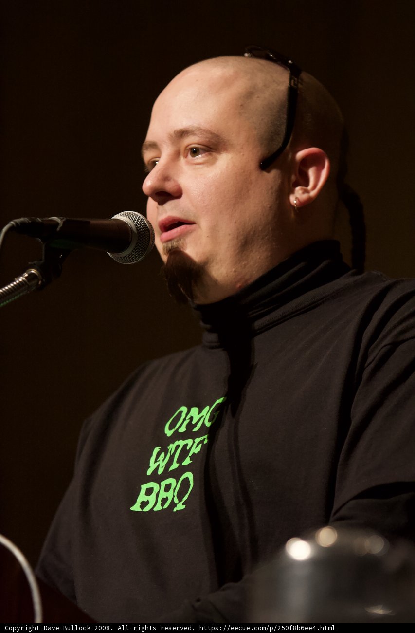 Green Shirted Entertainer Commands the Stage