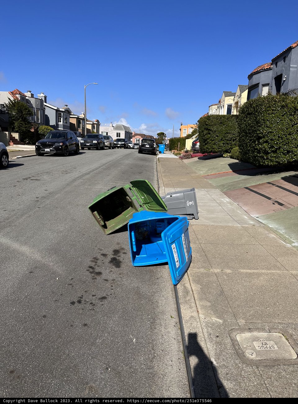 The Lonely Blue Trash Can in the City