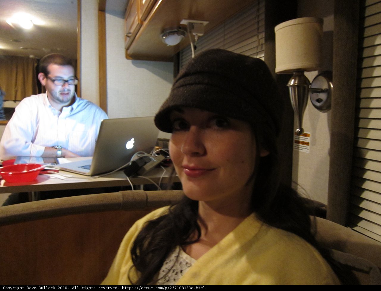 Stylish Hat-wearing Woman at Work