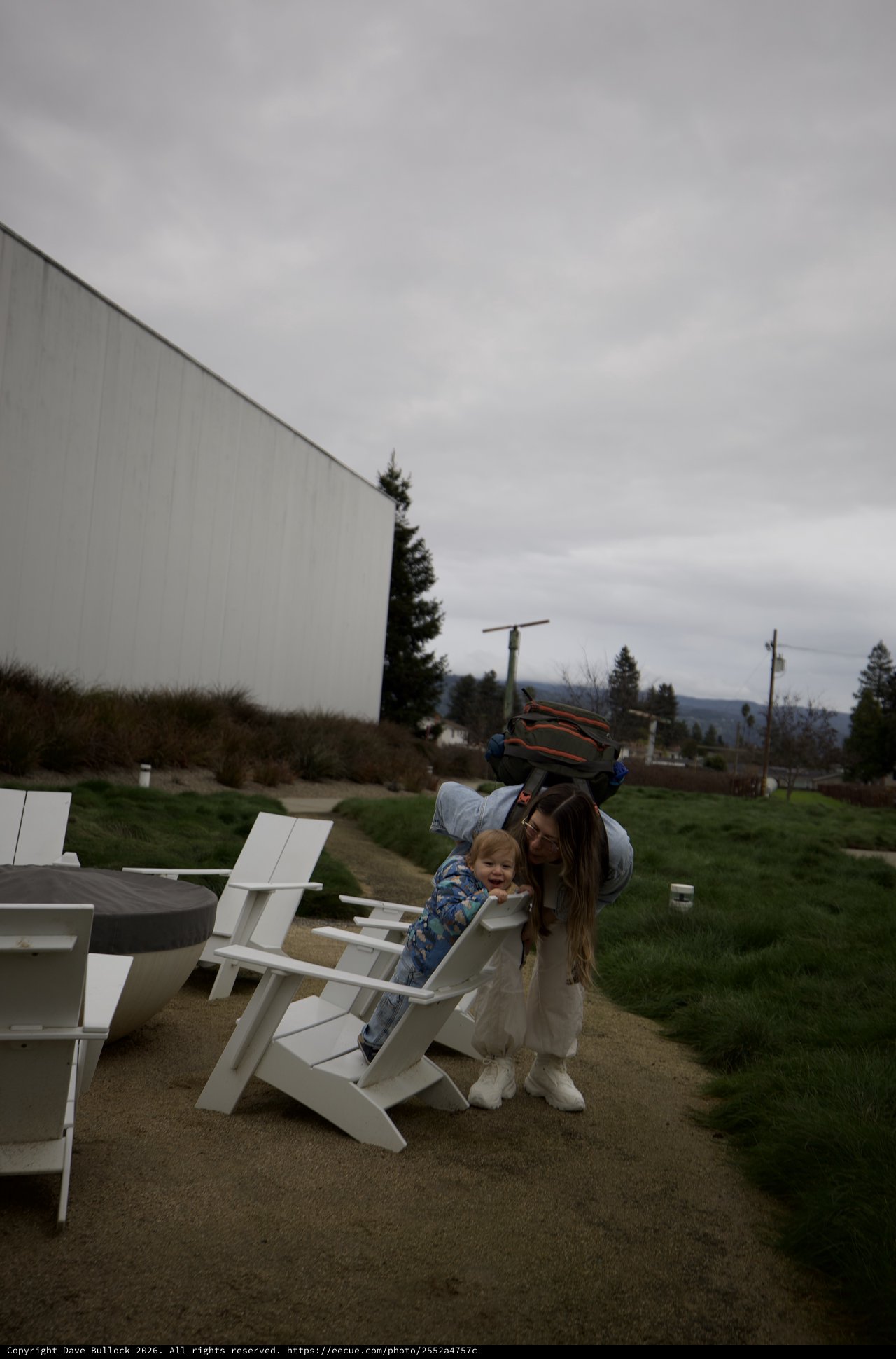 Playful Mother and Child Moment at Outdoor Venue
