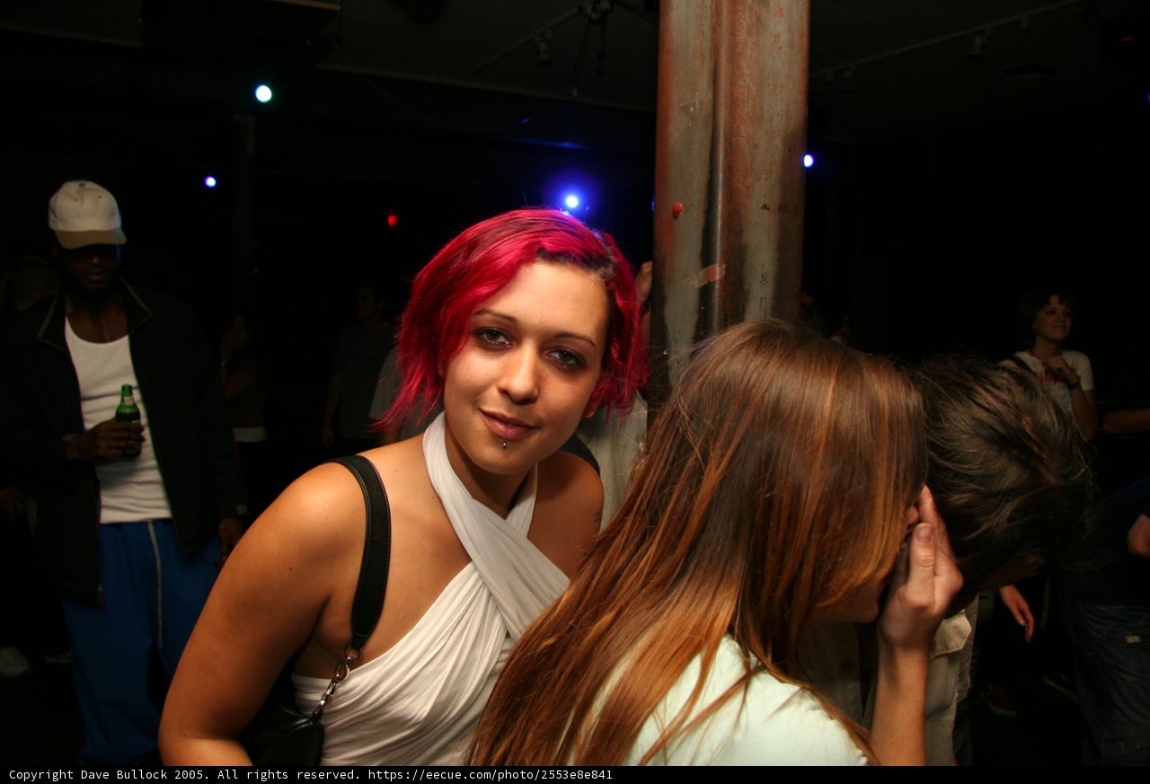 Pink-haired Woman at Urban Night Club