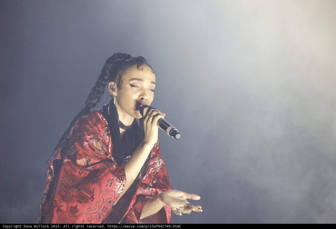 FKA twigs Stunning Portrait Baby Hairs Swirls Eyes Closed Red Lipstick Braided Ponytails Hoop Earrings Septum Ring Black Choker Red Brocade Kimono