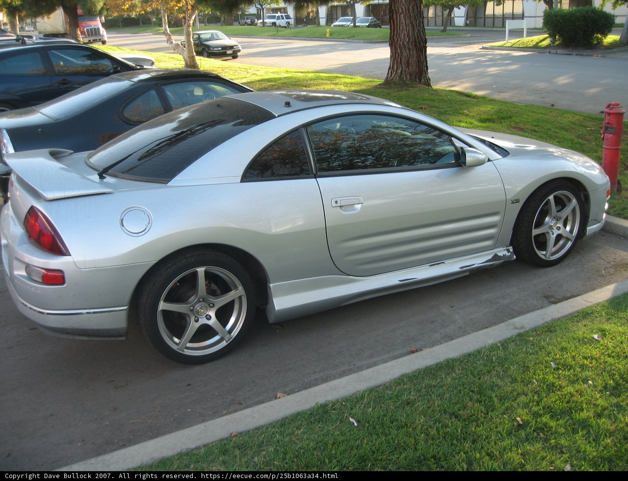 Sleek Silver Sports Car on Rural Road