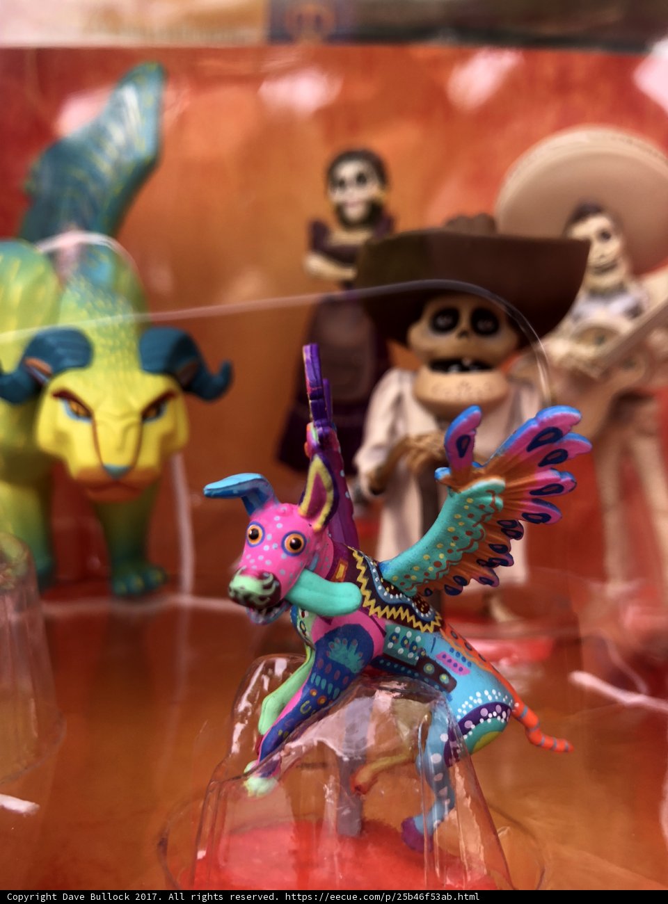 Colorful Figurine Duo: A Skeleton and His Trusty Steed