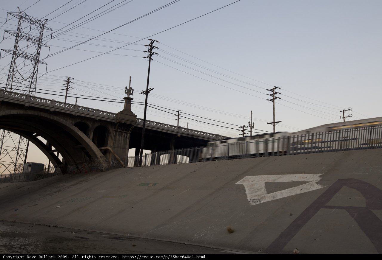Train passing under an overpass