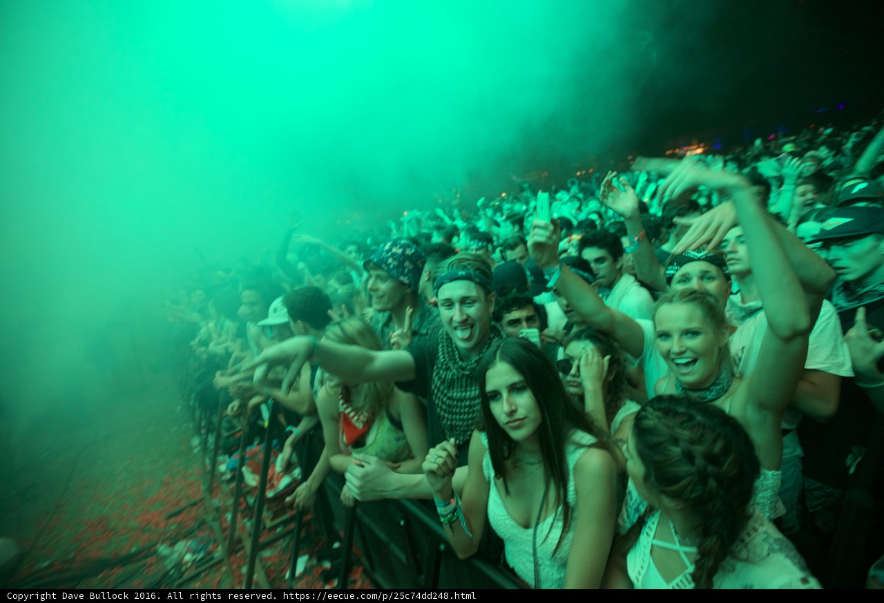 Smoke-filled Urban Concert Crowd