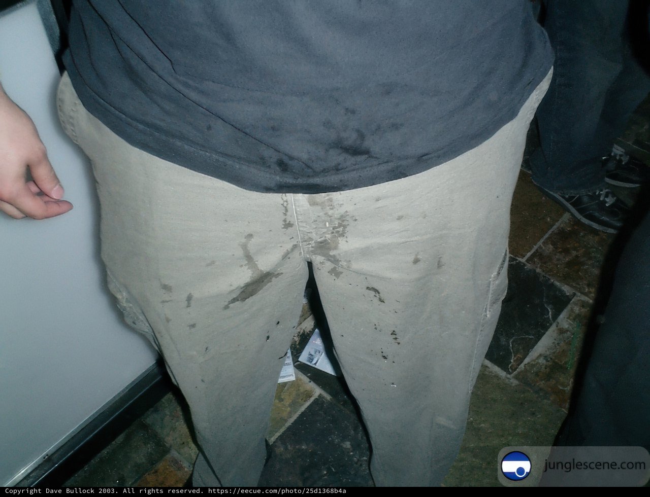 Stained Pants and Black Shirt