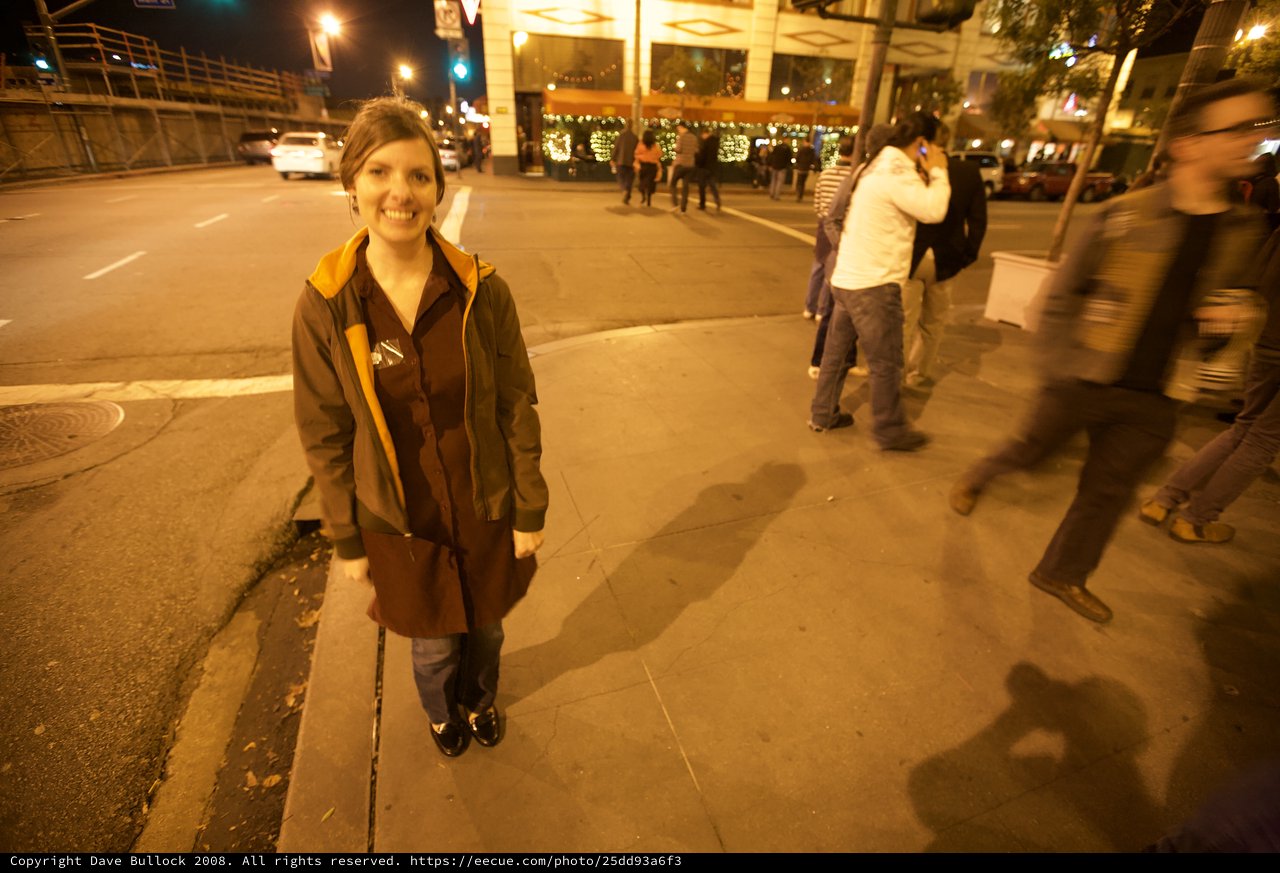 Smiling Woman on City Sidewalk Election Night 2008