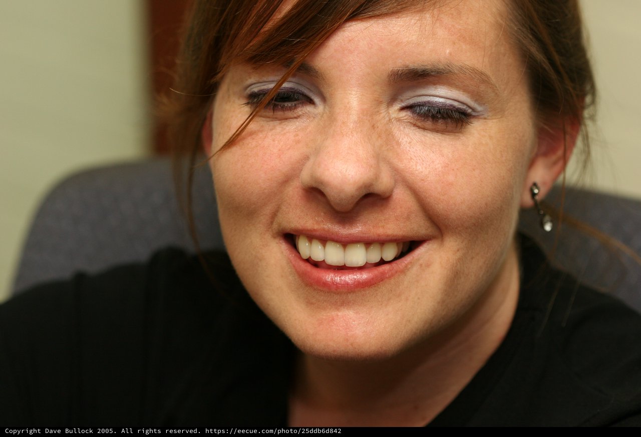 Warm Smile of a Red-Haired Woman Named Penelope