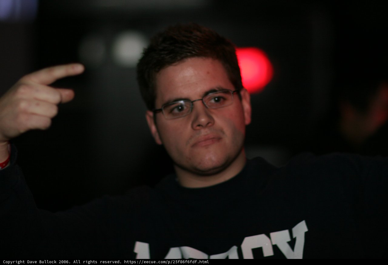 Blue-Shirted Man with Eyeglasses