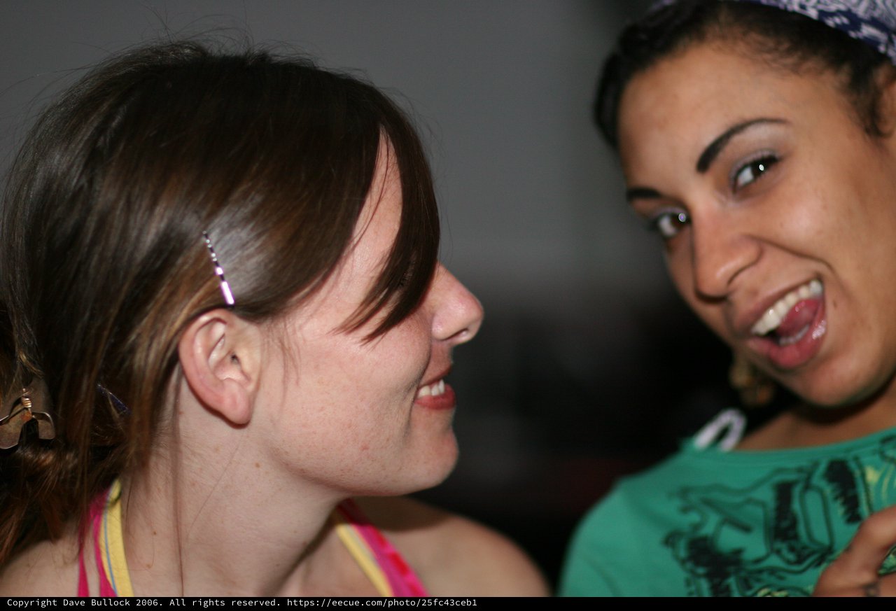 Two Friends Share a Joyful Moment Together