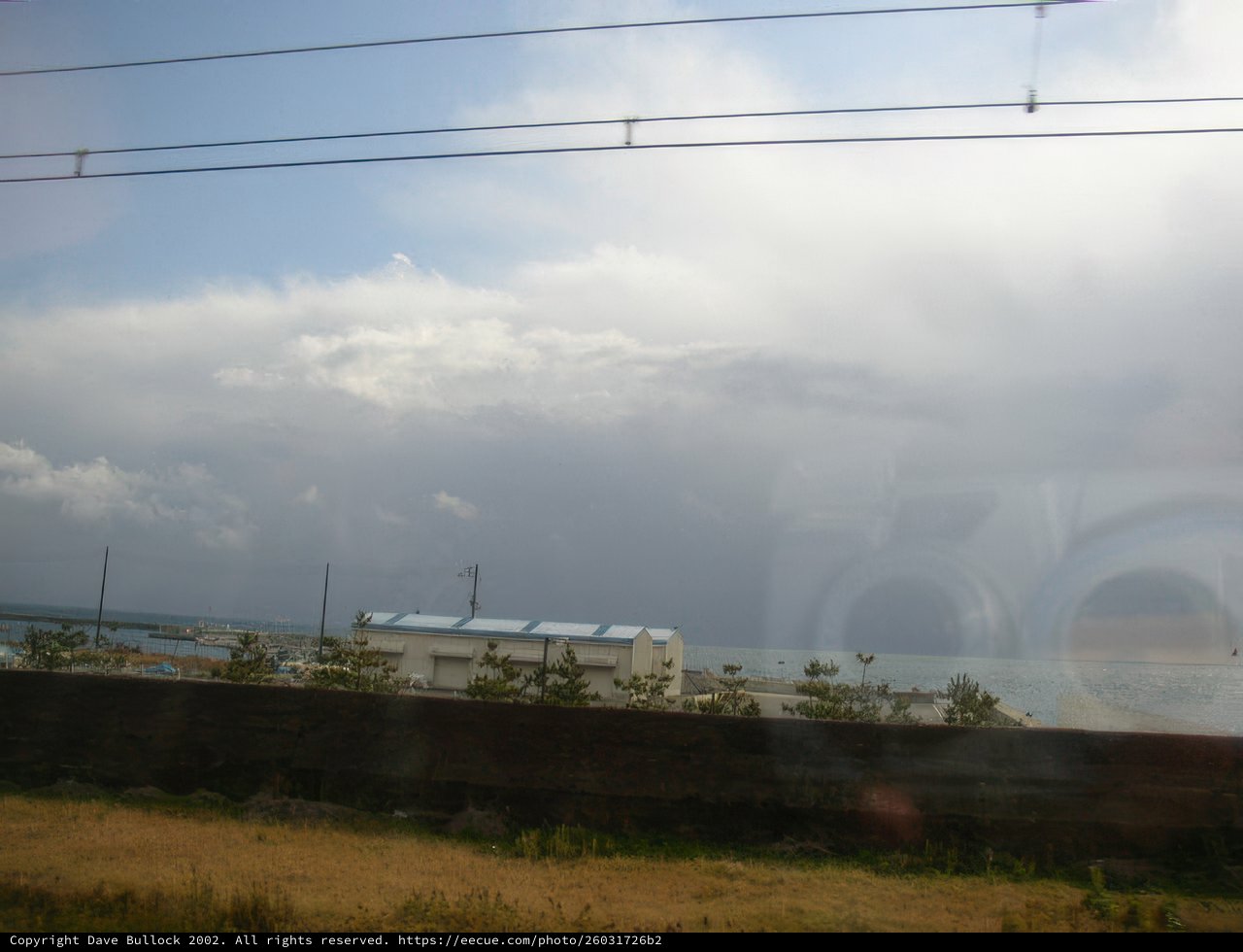 Ocean View from a Moving Train