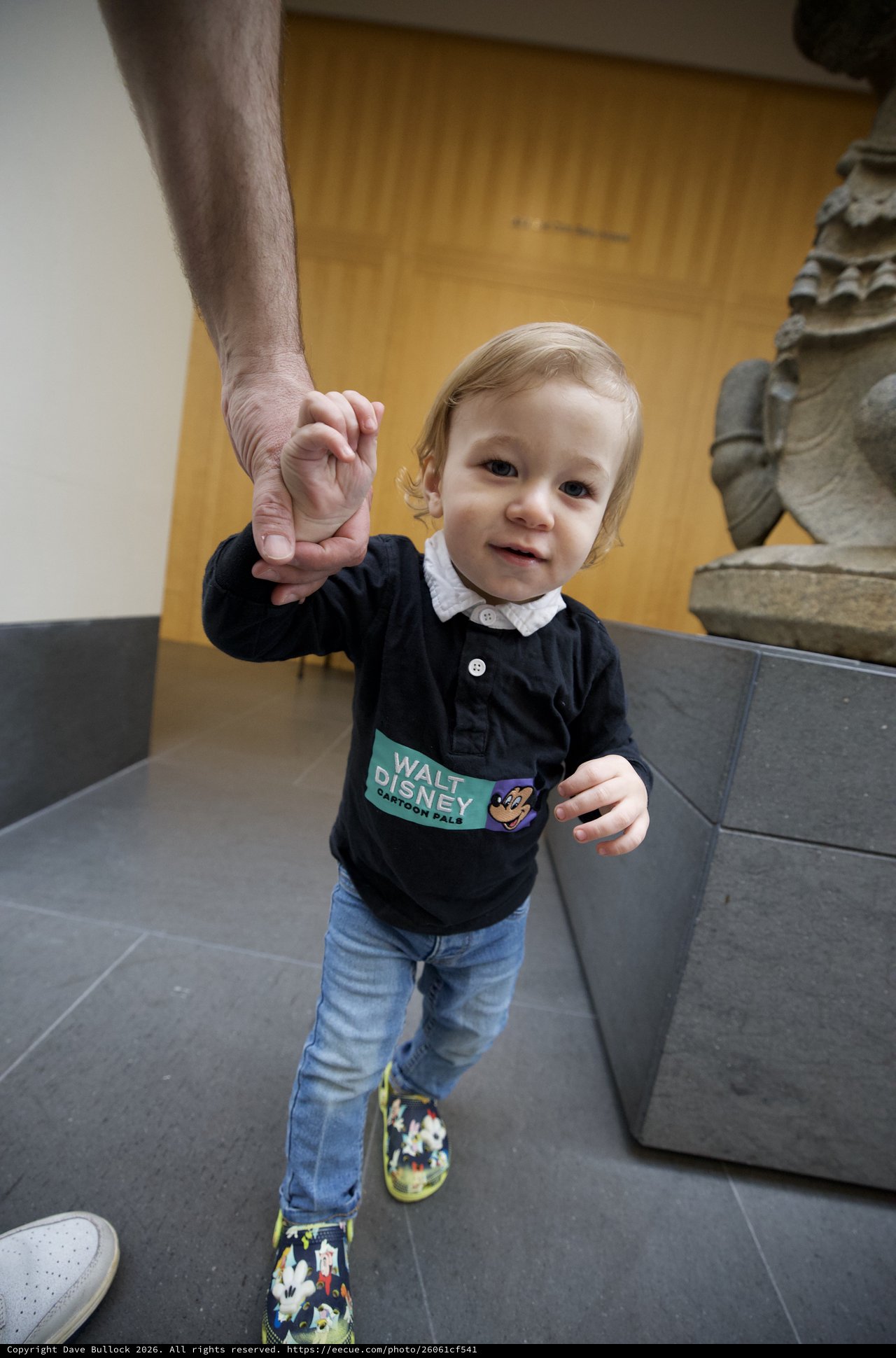 Toddler Holding Adult's Hand at Asian Art Museum