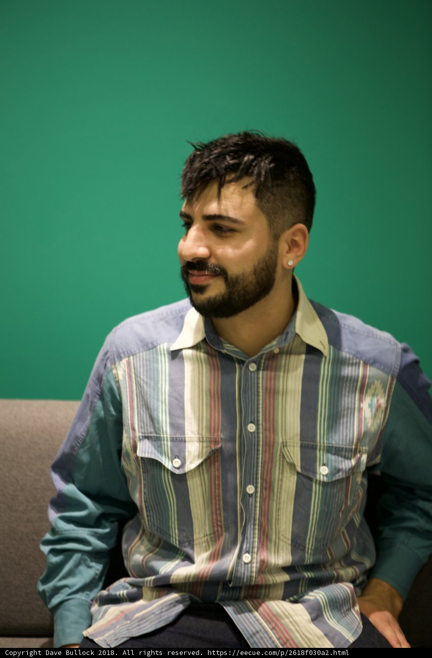 A Happy Man in a Striped Shirt