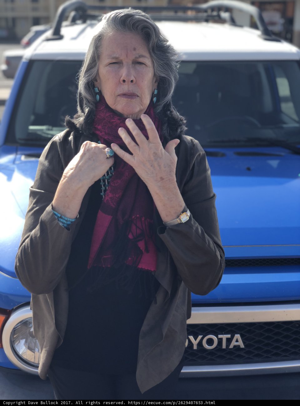 The Woman with a Scarf and a Ring
