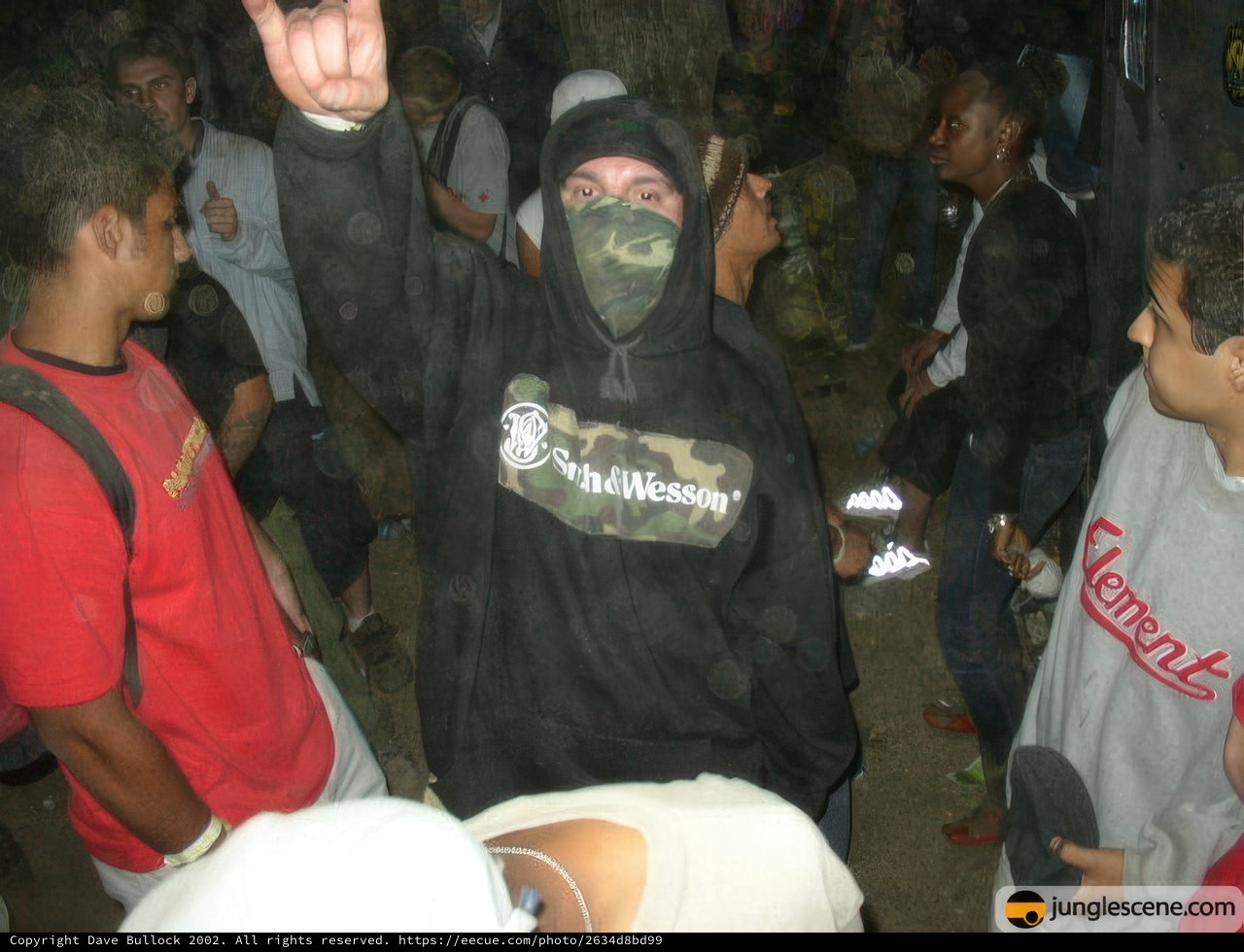 Masked Man with Cell Phone
