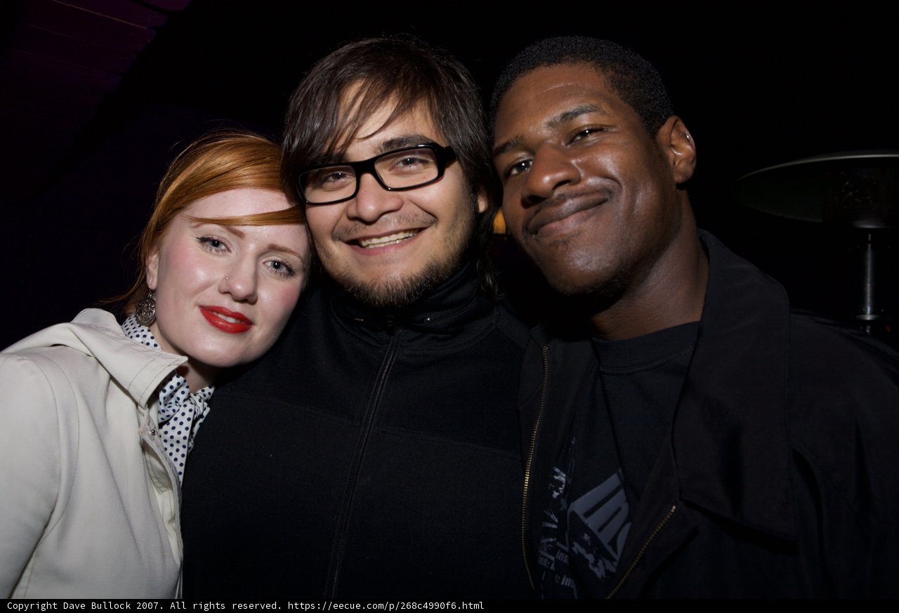 Formal Portrait of Three Happy Adults