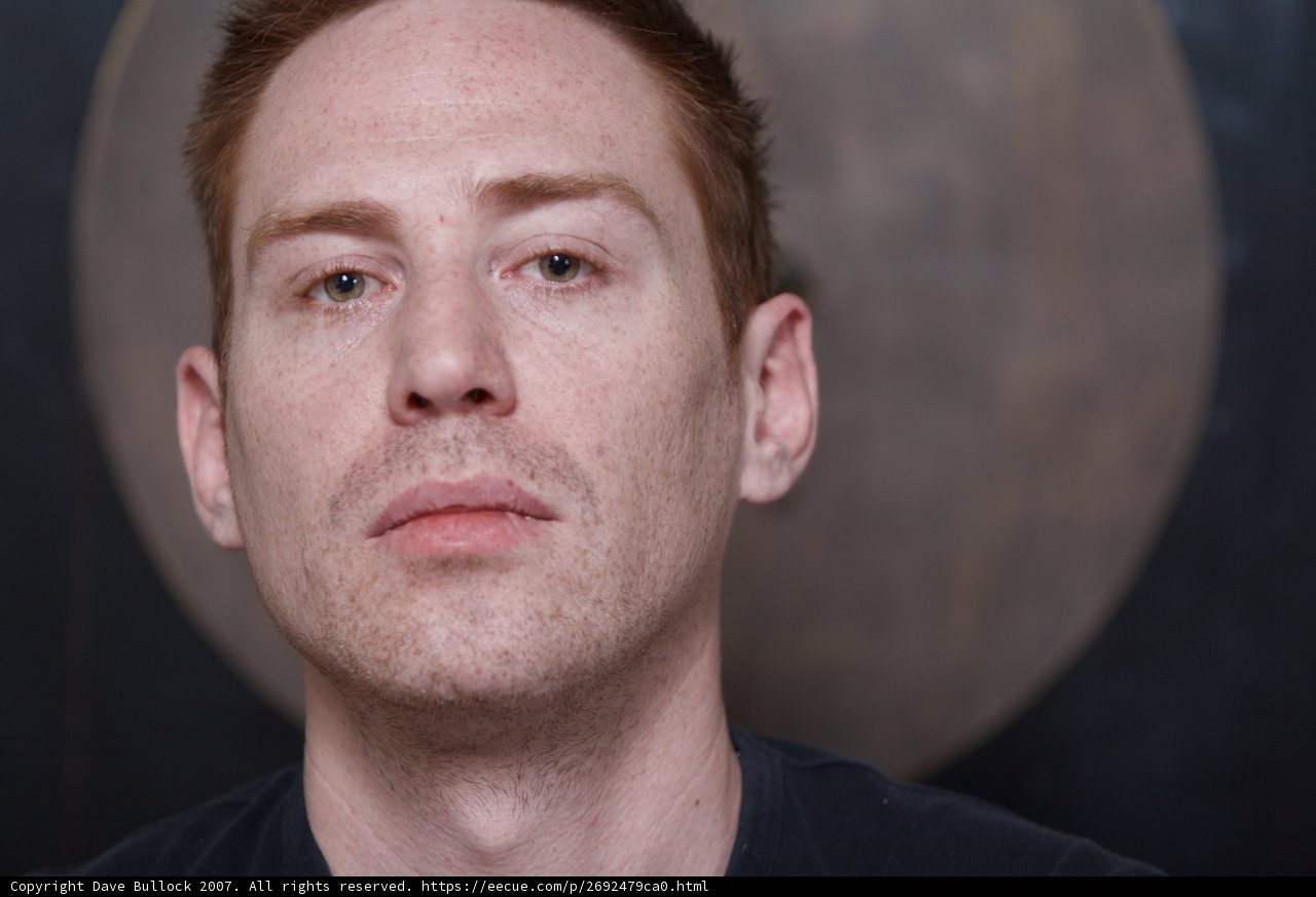 Redheaded Man in Black Shirt