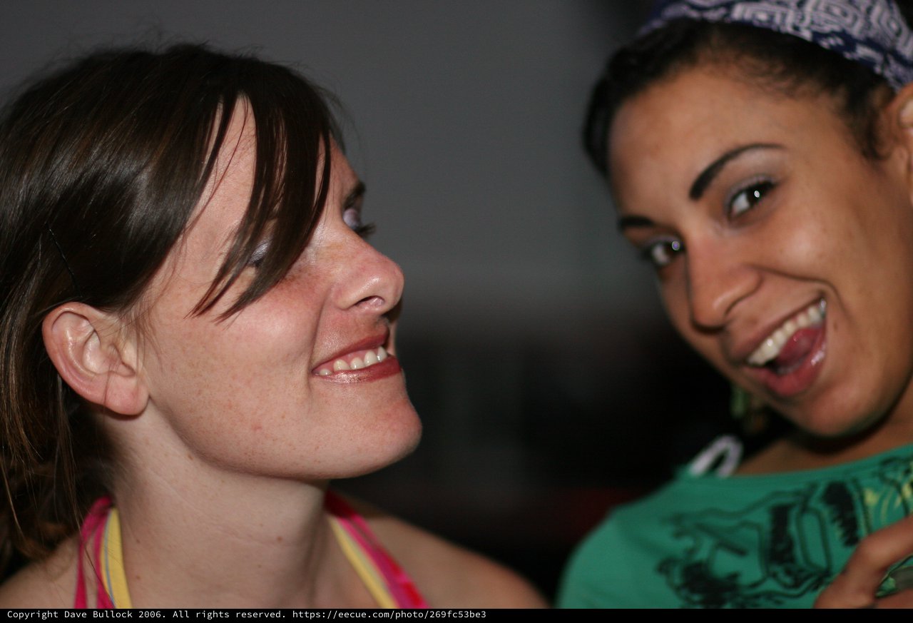 Two Friends Share a Joyful Moment Together