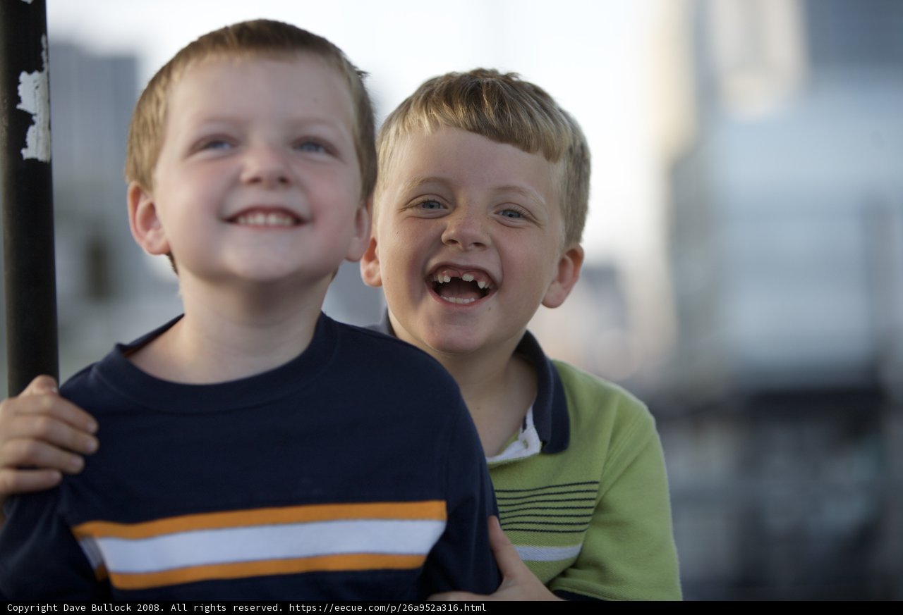 Two Happy Boys Standing Together