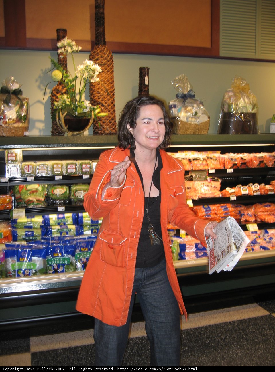 Orange Coat in the Deli